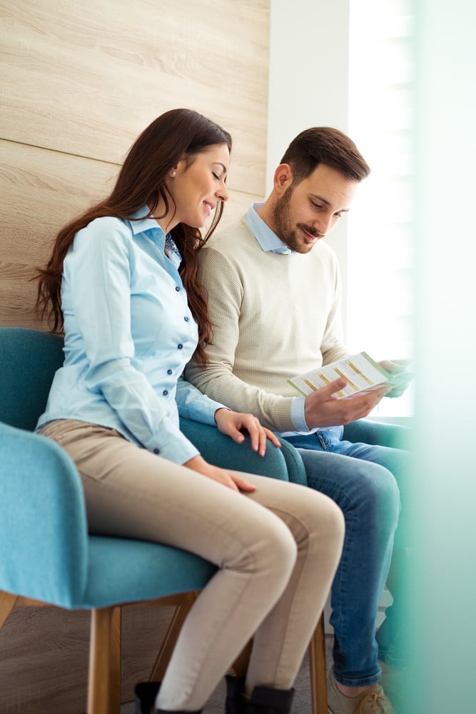 A couple in a waiting room 